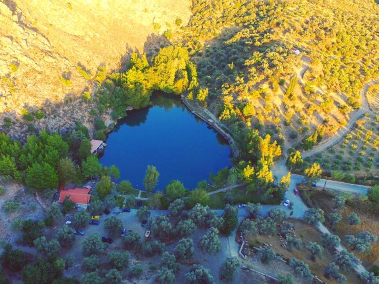 Eleonas Country Hotel Village, eleonas traditional hotel, eleonas traditional cottages, six days hiking eleonas, wild flowers, ancient olive trees and groves, small rivers, monasteries, gorges, secret forests, hidden villages, and old pathways, votomos lake