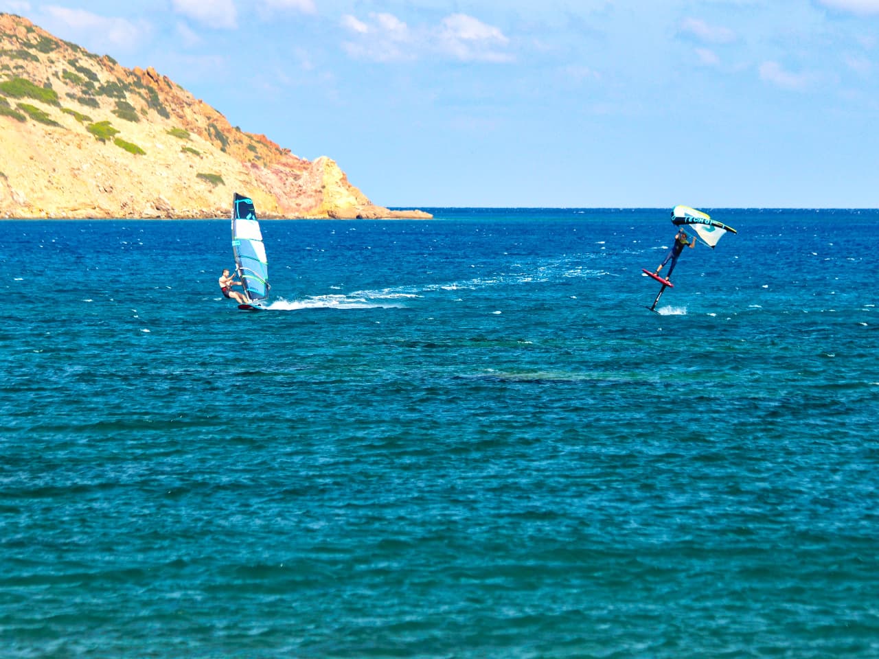 windsurfing lessons kouremenos beach, foil windsurfing lessons kouremenos, windsurfing rentals, foil windsurfing rentals east crete, kouremenos beach best place for windsurfing, best windsurfing center crete, best equipment for windsurfing crete