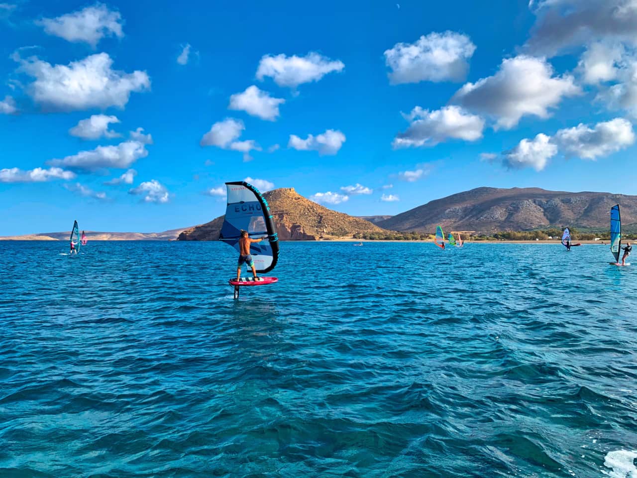 windsurfing lessons kouremenos beach, foil windsurfing lessons kouremenos, windsurfing rentals, foil windsurfing rentals east crete, kouremenos beach best place for windsurfing, best windsurfing center crete, best equipment for windsurfing crete