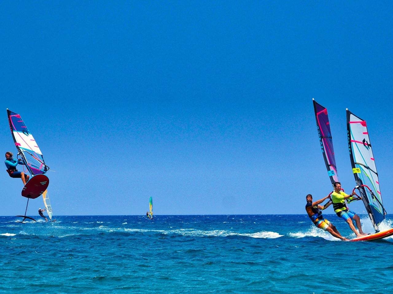 windsurfing lessons kouremenos beach, foil windsurfing lessons kouremenos, windsurfing rentals, foil windsurfing rentals east crete, kouremenos beach best place for windsurfing, best windsurfing center crete, best equipment for windsurfing crete