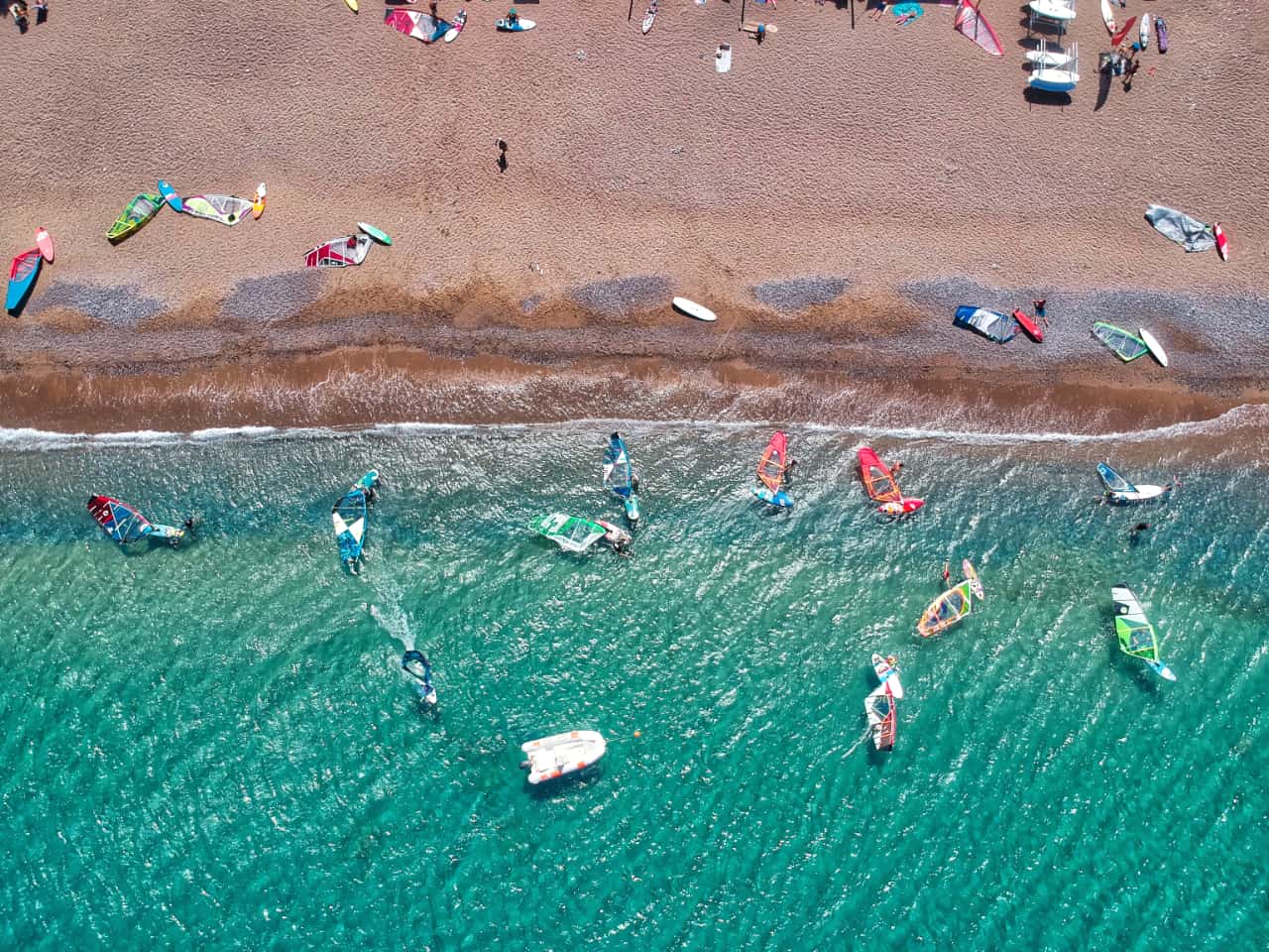 windsurfing lessons kouremenos beach, foil windsurfing lessons kouremenos, windsurfing rentals, foil windsurfing rentals east crete, kouremenos beach best place for windsurfing, best windsurfing center crete, best equipment for windsurfing crete