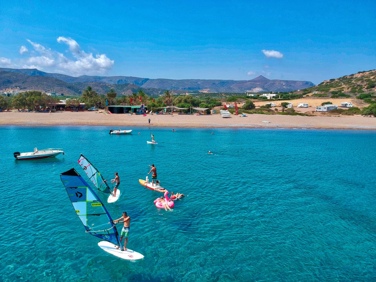 windsurfing lessons kouremenos beach, foil windsurfing lessons kouremenos, windsurfing rentals, foil windsurfing rentals east crete, kouremenos beach best place for windsurfing, best windsurfing center crete, best equipment for windsurfing crete