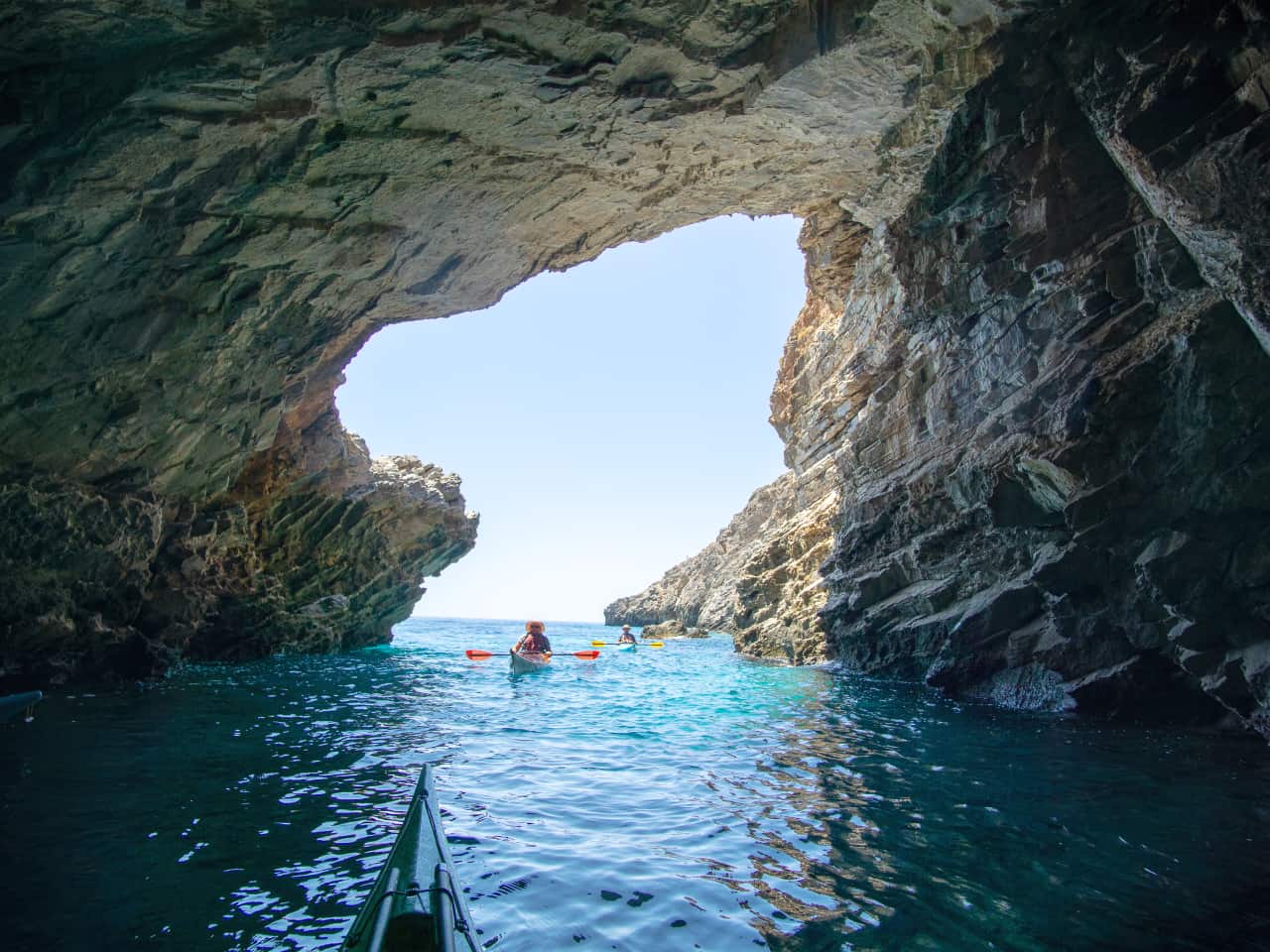 Exploring one of the impressive caves in south Chania, Crete, samaria national park sea kayak trip, best sea kayak trip south chania, two day sea kayak trip loutro, sea kayak trip  agia roumeli, sea kayak trip agios pavlos beach
