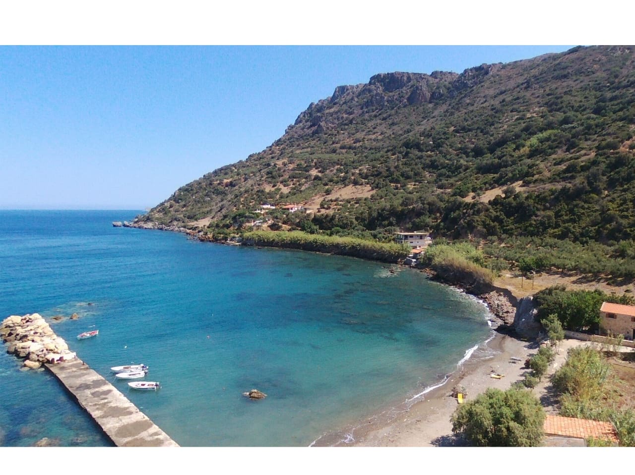 The small port of Ravdoucha and Neratzia Beach